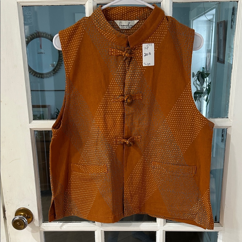 298.   Orange Sleeveless Top with Knot Details